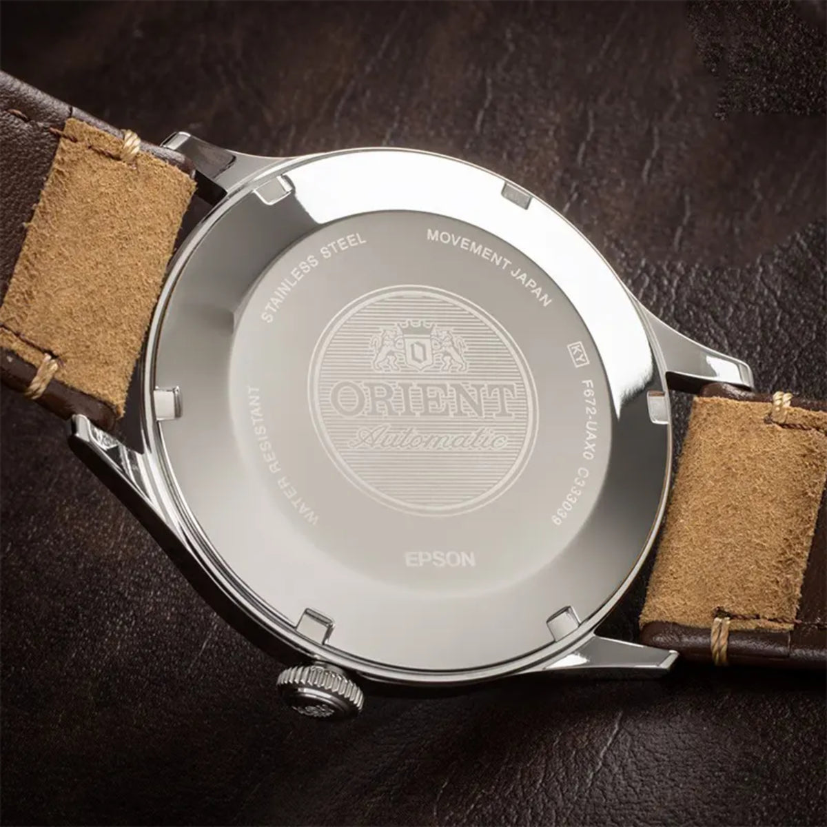 Rear view of Orient Bambino RA-AC0P01E30B stainless steel case back with engraved brand logo and movement details
