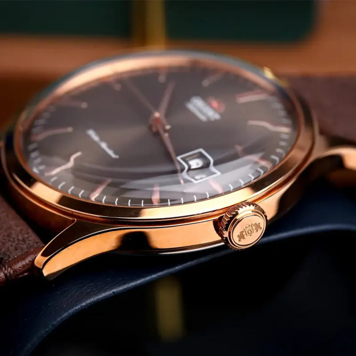 Orient Bambino RA-AC0P04Y30B side view displaying polished case edge and crown with brand logo
