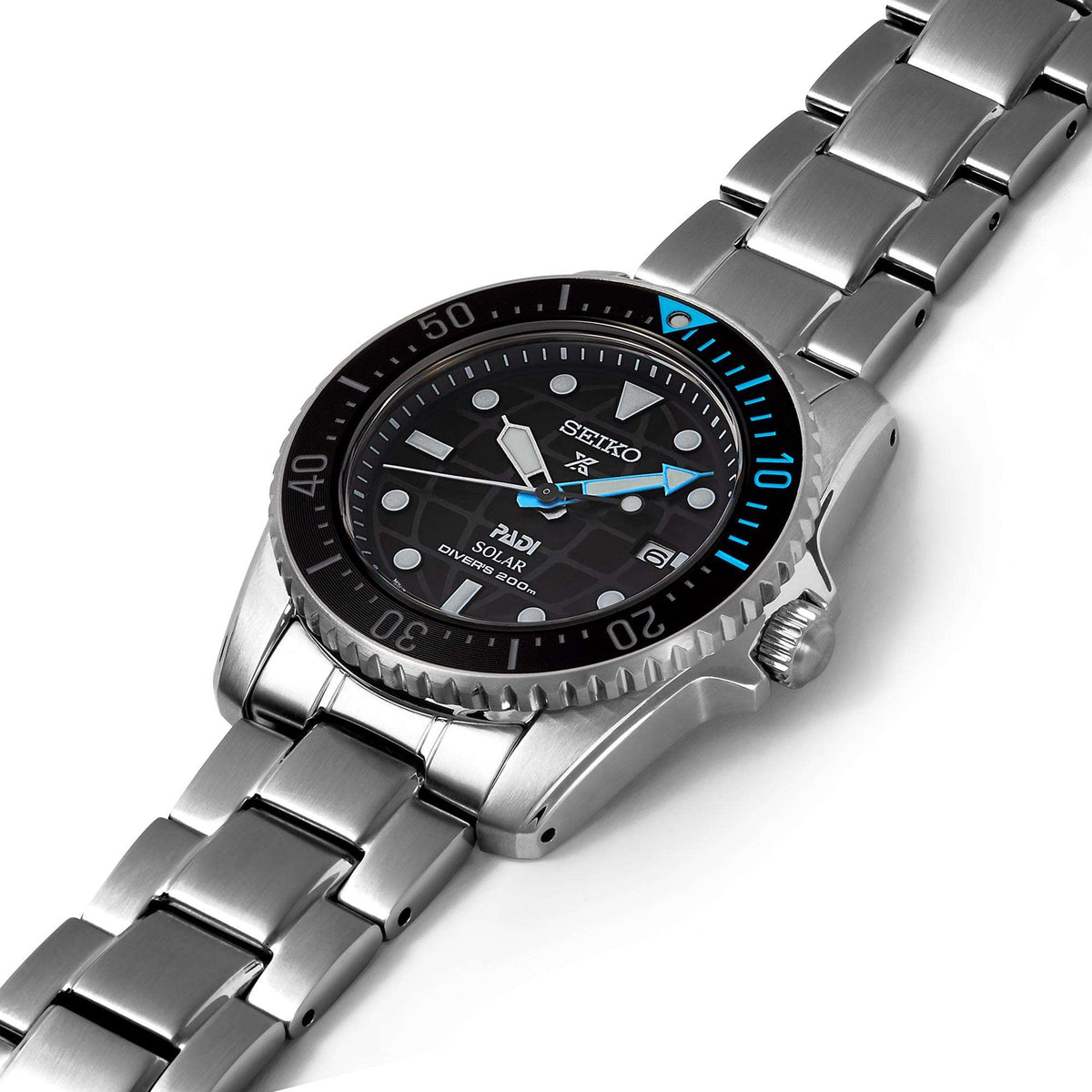 Stainless steel dive watch with black dial, blue accents, and metal bracelet