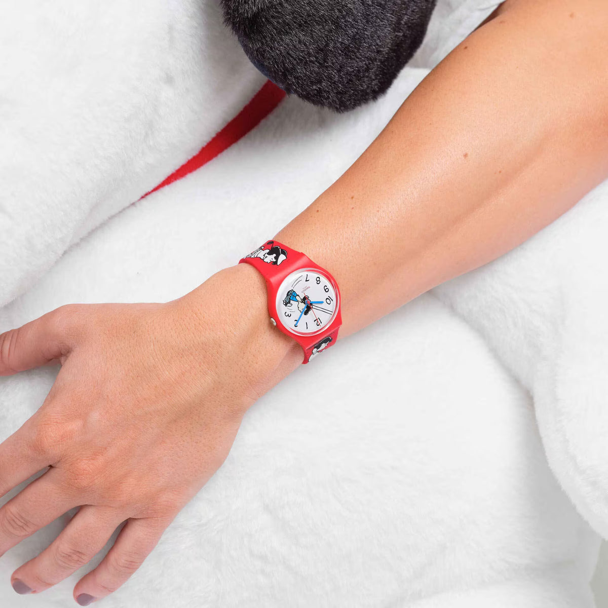 Peanuts silicone quartz watch on arm, red strap with character print and white dial