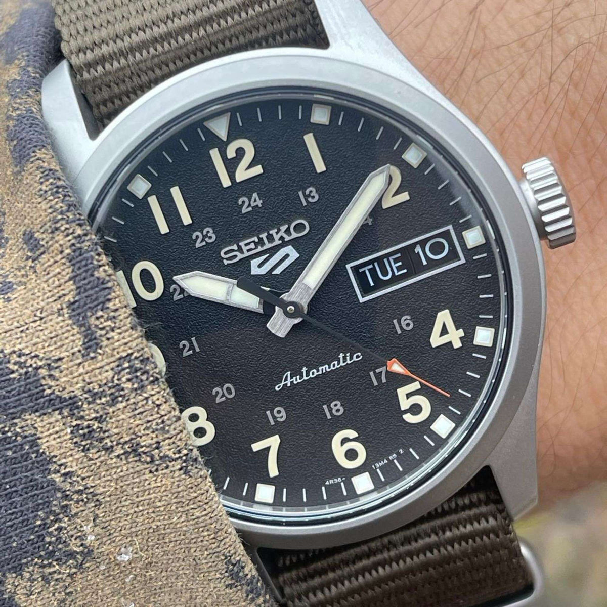 Seiko 5 Sports Midfield SRPJ85K1 macro wrist shot high angle view