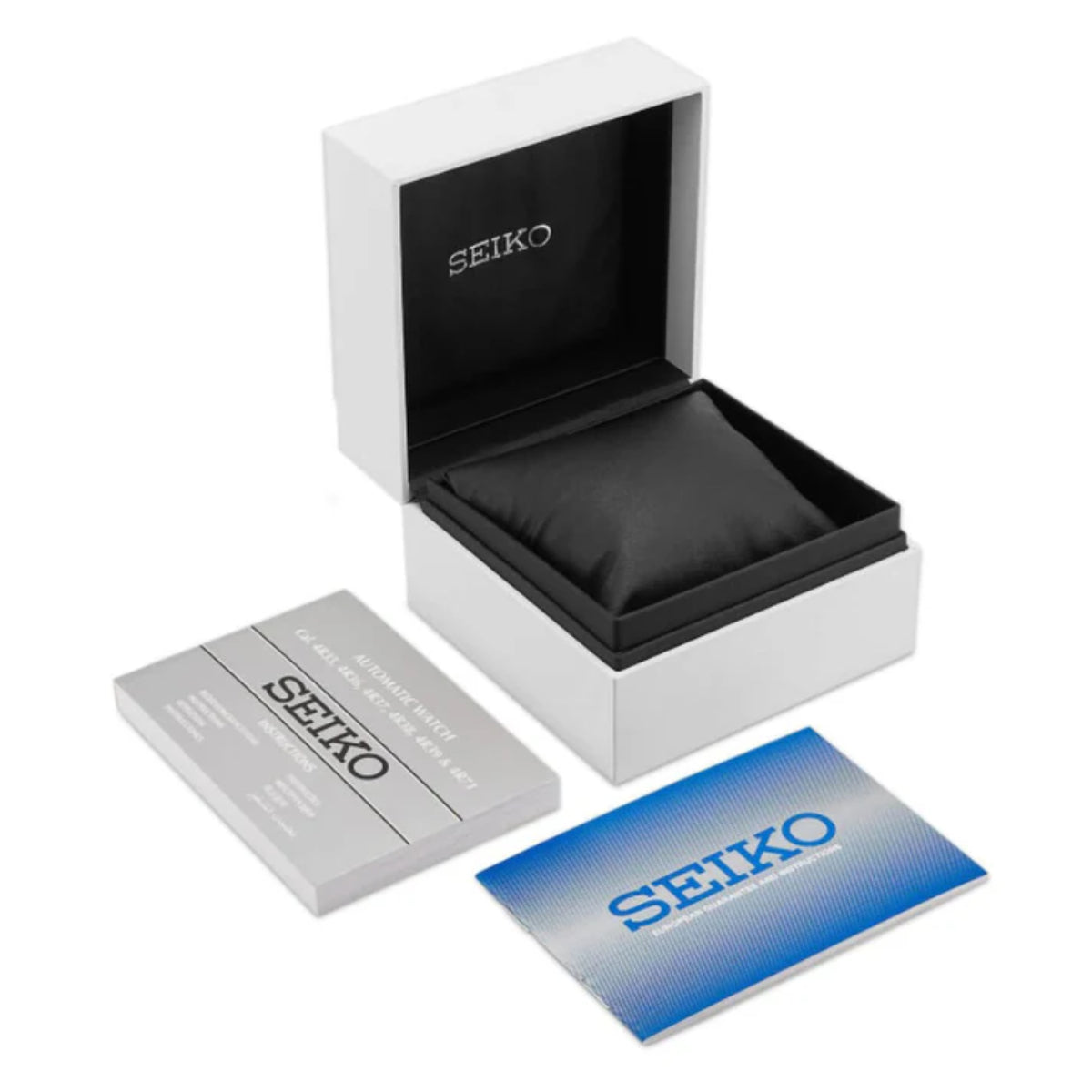 Seiko watch gift box with black cushion and instruction card; watch not shown