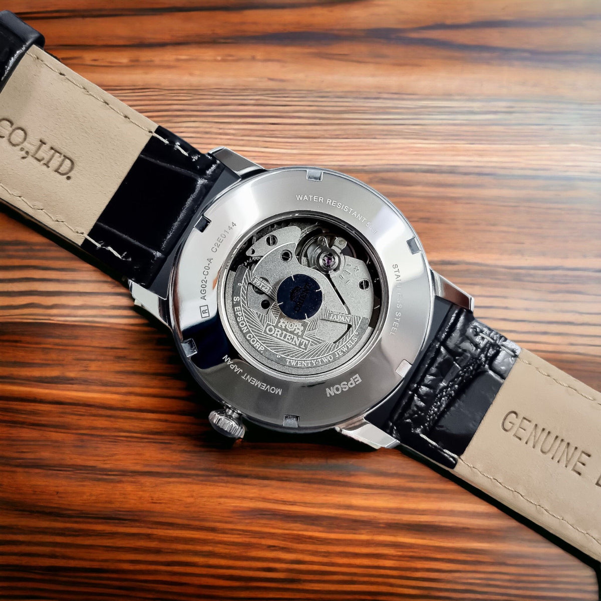 Orient open-heart automatic watch with black dial and black leather strap, 41mm case