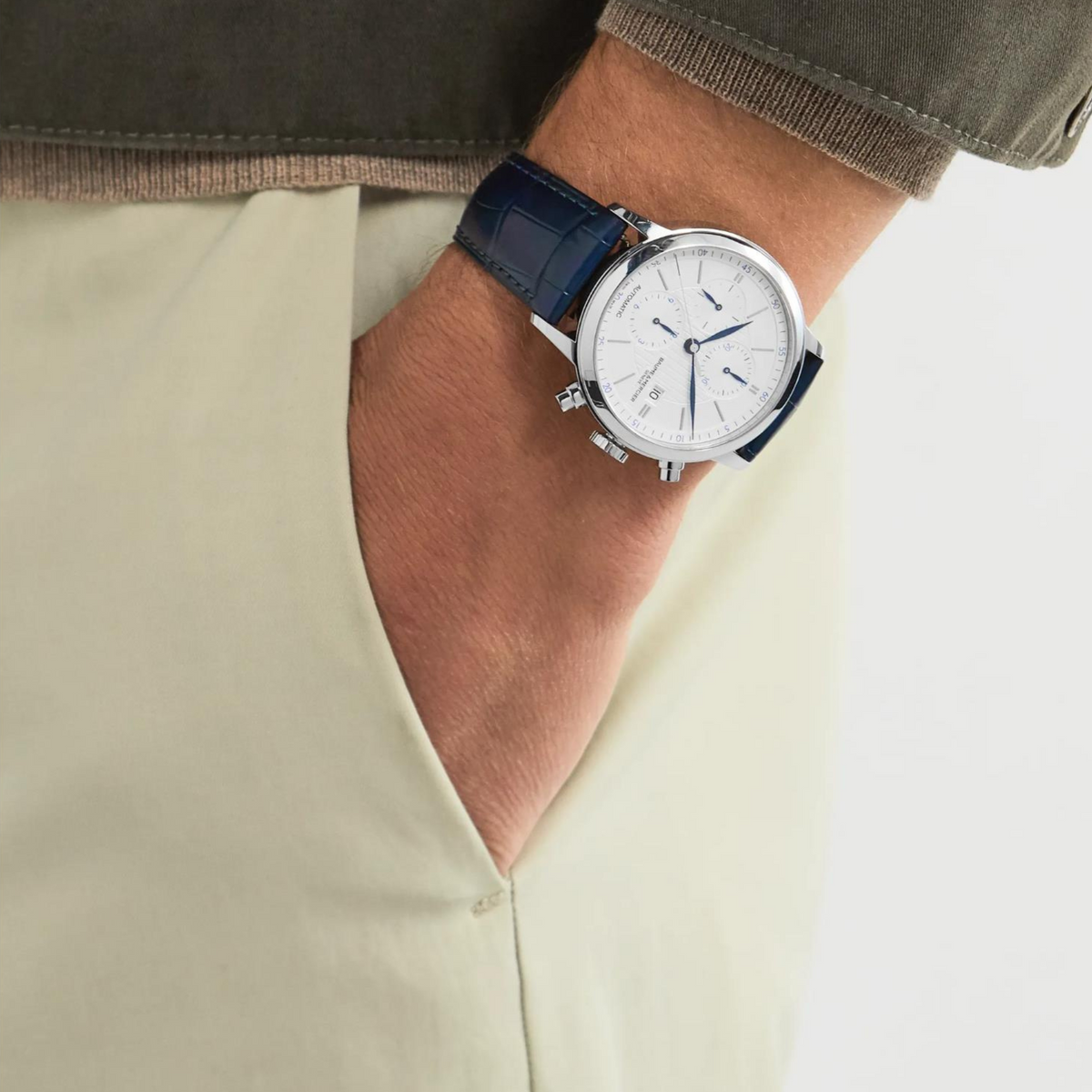 Baume & Mercier Classima automatic chronograph on wrist, blue leather strap, silver case