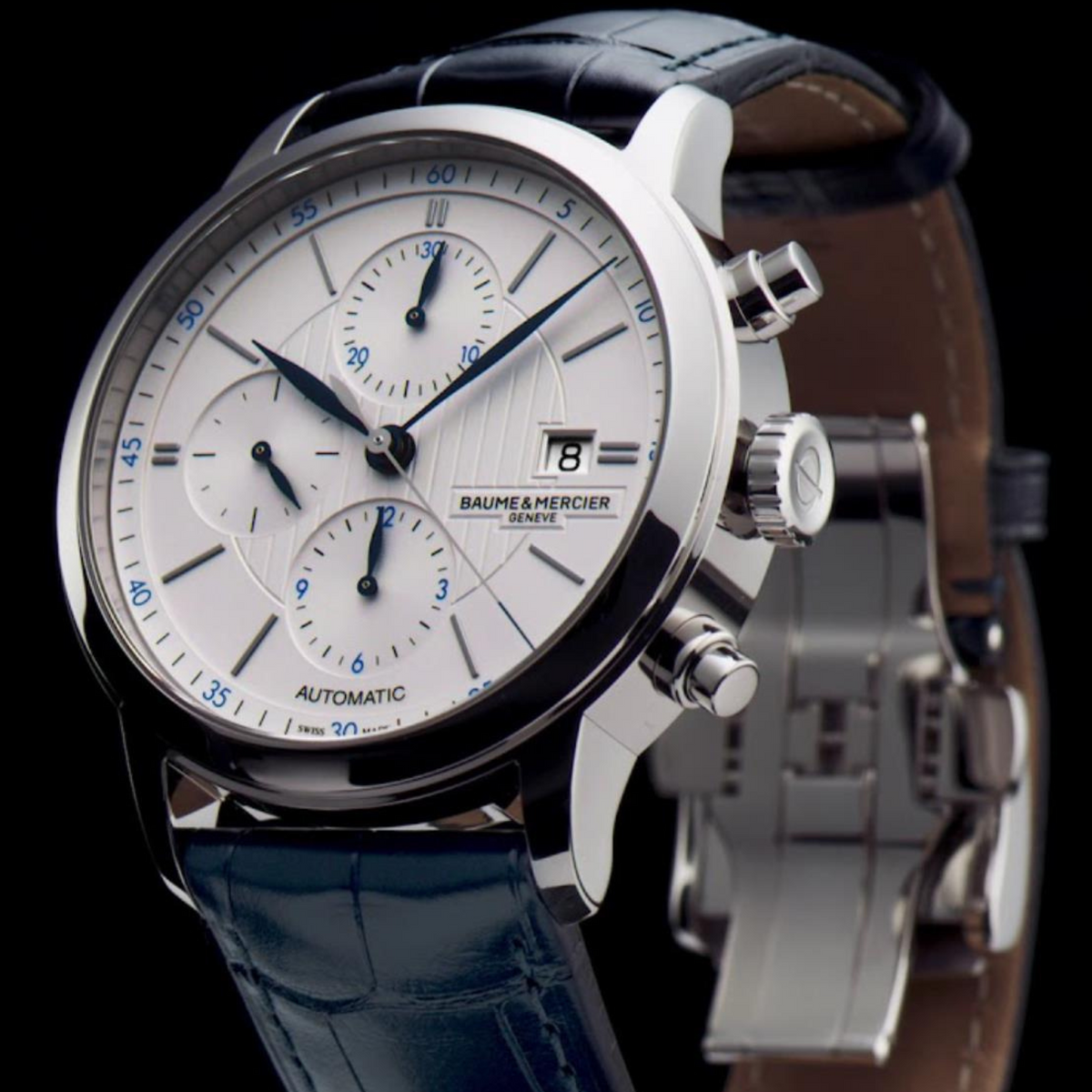 Baume & Mercier Classima automatic chronograph watch close-up with white dial and blue subdial hands