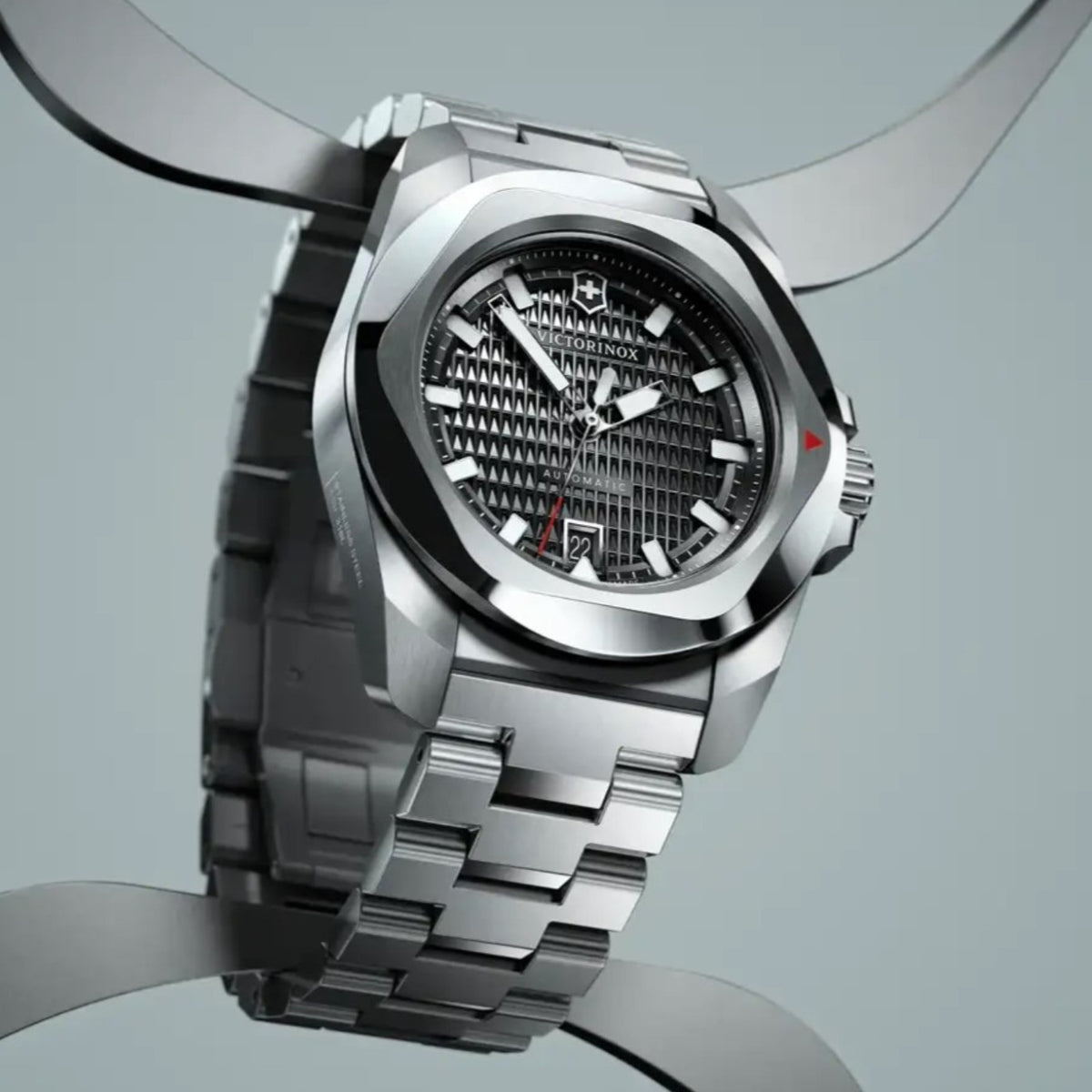 Victorinox I.N.O.X. Automatic stainless steel watch with textured black guilloché dial