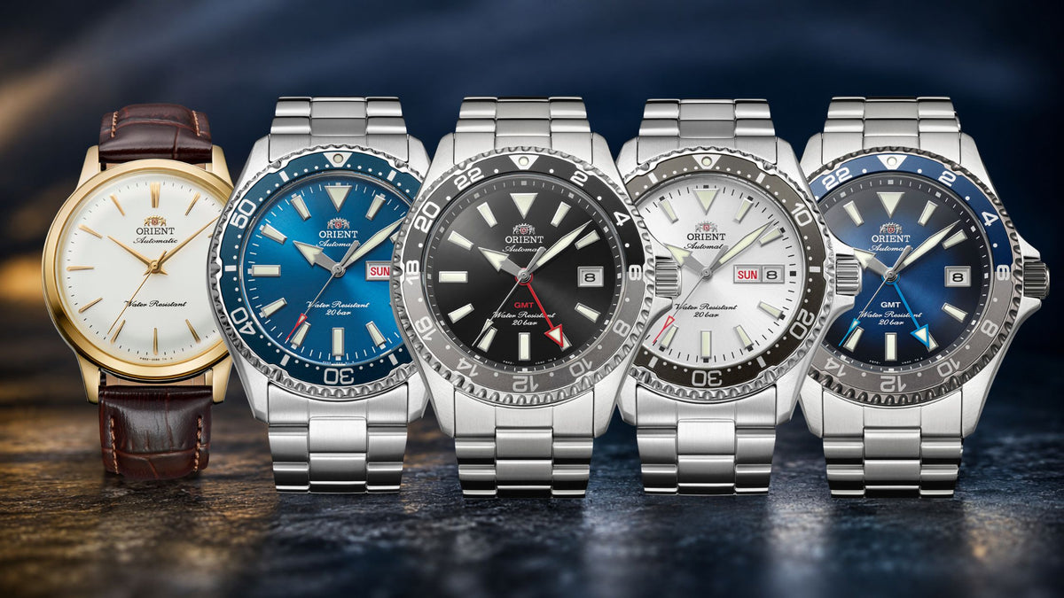 Orient watches for men lineup featuring stainless steel dive timepieces and a classic leather strap model on a dark backdrop
