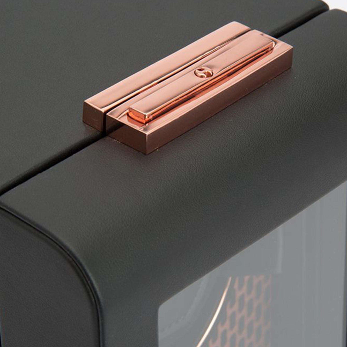 Single watch winder top bar with copper finish on black housing