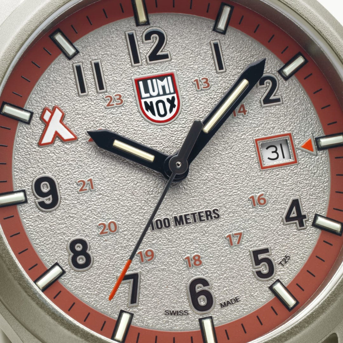 Macro close-up shot highlighting the black hands, red inner ring, and detailed face markers of the Luminox Bear Grylls Survival XB.3717