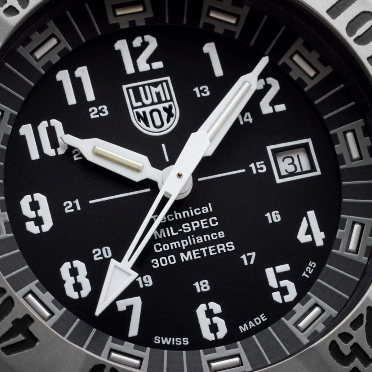 Close-up black dial with LUMINOX logo, white hands, and day-date window