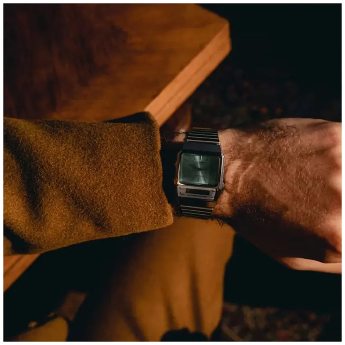 Casio Vintage Edgy AQ-800EC-2AE lifestyle shot on a wrist next to a wooden table
