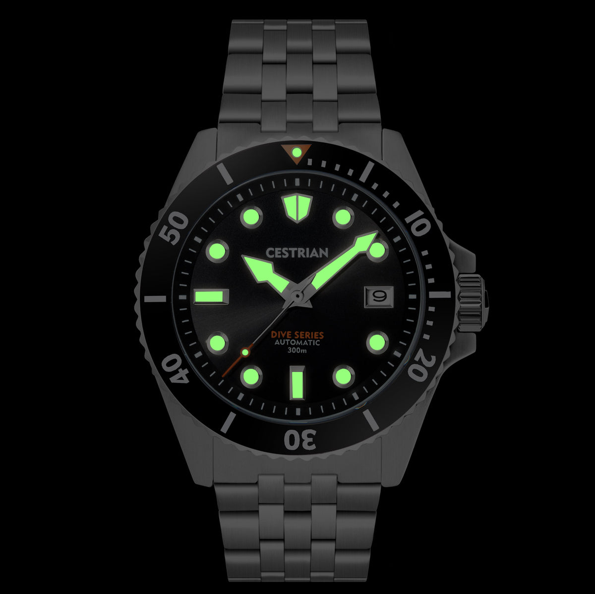 Men's dive watch on dark background: black dial, green luminous hands, steel bracelet, black bezel