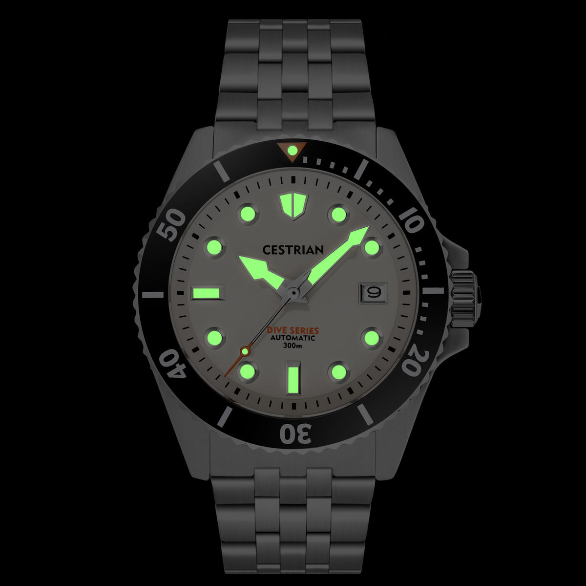 Men's dive watch with black dial glowing green lume, black bezel, steel bracelet
