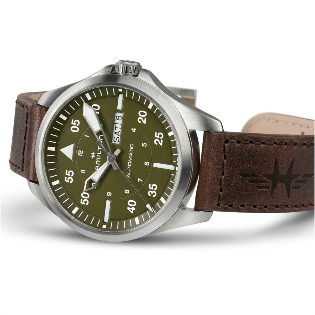Hamilton Khaki Aviation H64635560 mens watch angled detail highlighting green dial, day-date window, and embossed brown leather strap