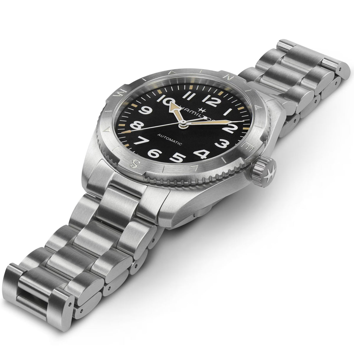 Full view of a stainless steel Hamilton automatic watch with a black dial and compass bezel