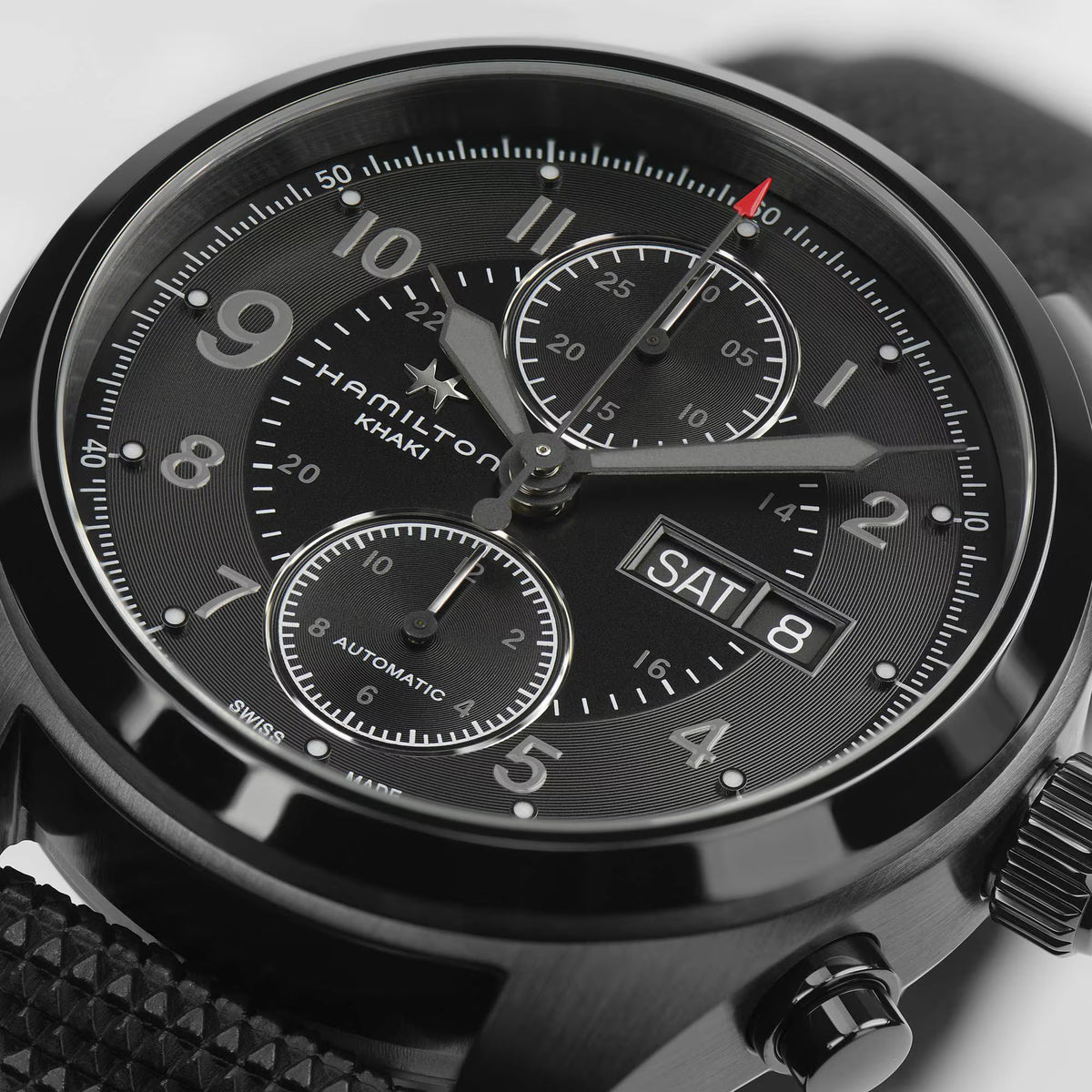 Hamilton Khaki Field mens watch H71626735 close-up detailing the black dial, chronograph sub-dials, and day-date window