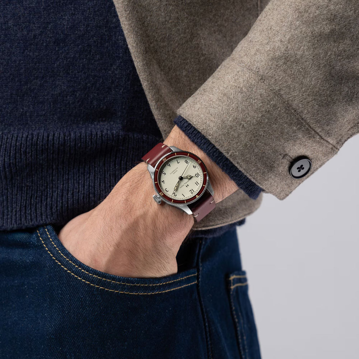 Men's automatic pilot leather watch with eggshell dial and brown strap on wrist