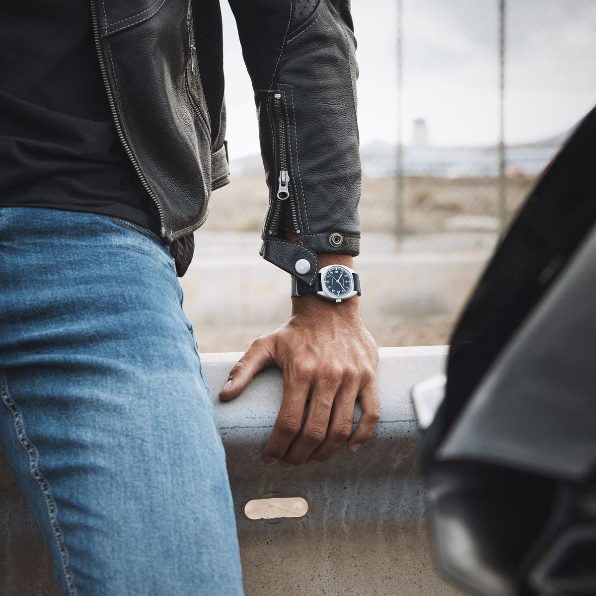 Hamilton mechanical watch with a blue dial on wrist
