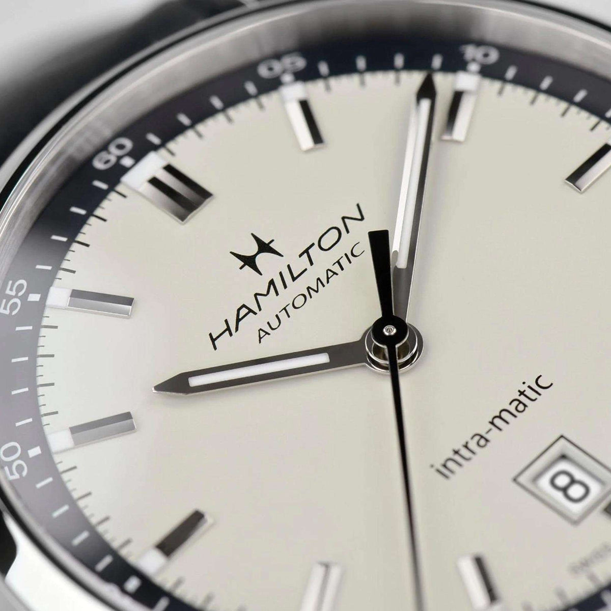 Hamilton American Classic automatic watch with beige dial and black leather strap, close-up