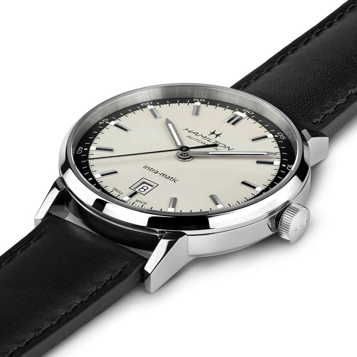Hamilton automatic watch with beige dial and black leather strap, side angle view