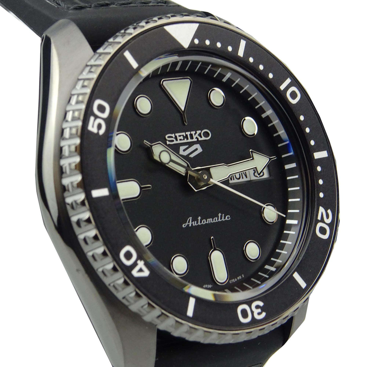 Men's automatic watch with black dial and black-and-blue bezel, black leather strap.
