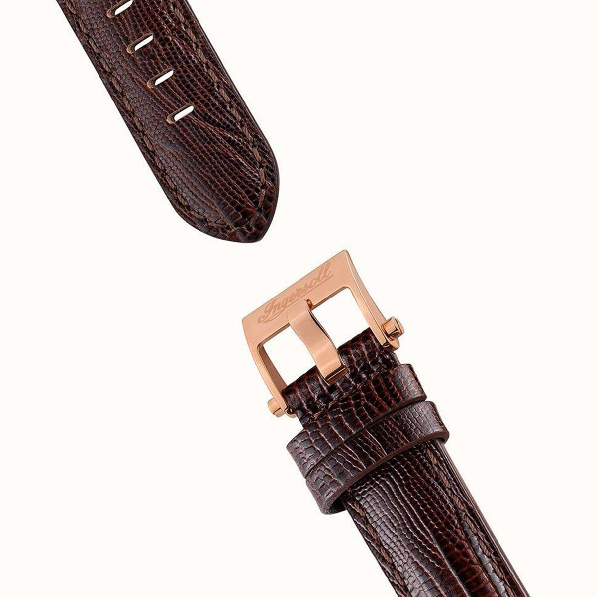 Brown leather watch strap with metal buckle and stitching, strap end shown