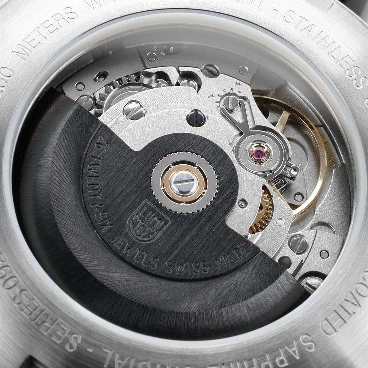 Sport watch caseback showing mechanical inner components under transparent cover