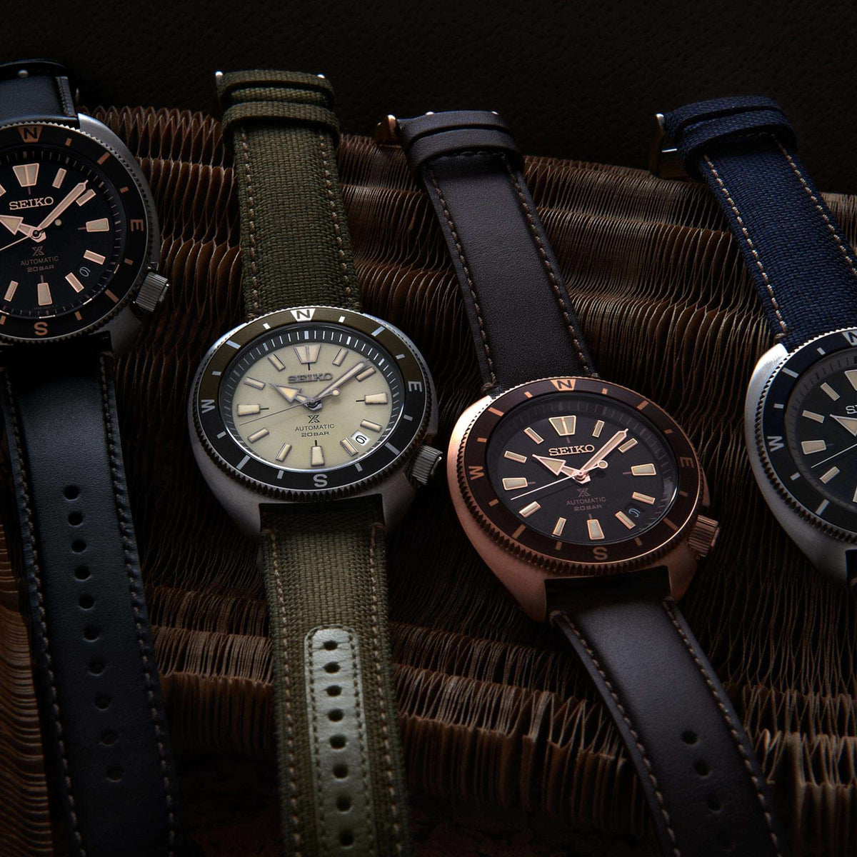Men's automatic watch with tan dial and green polyester bracelet, round steel bezel
