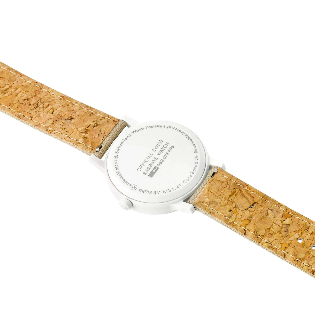 Mondaine Essence quartz watch caseback with tan leather strap