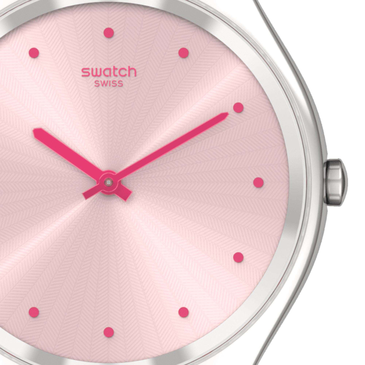 Close-up of pink moire-style dial with pink hands and dot markers on silver case