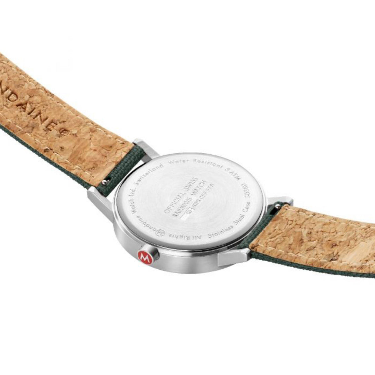 Mondaine watch side view with white dial and silver case on tan leather strap