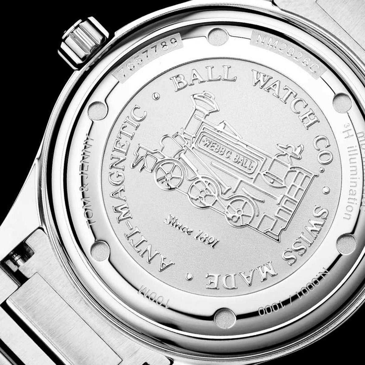 Stainless steel watch caseback with engraved train design and 'BALL WATCH CO' text