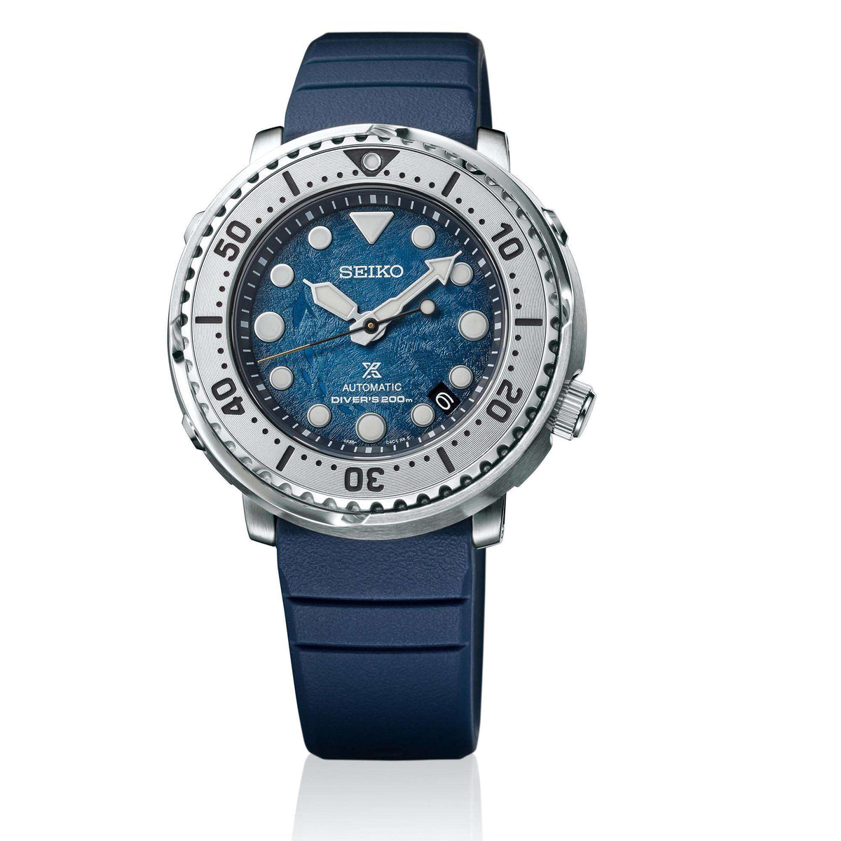 Men's automatic diver watch with blue dial, silver bezel, and navy silicone strap