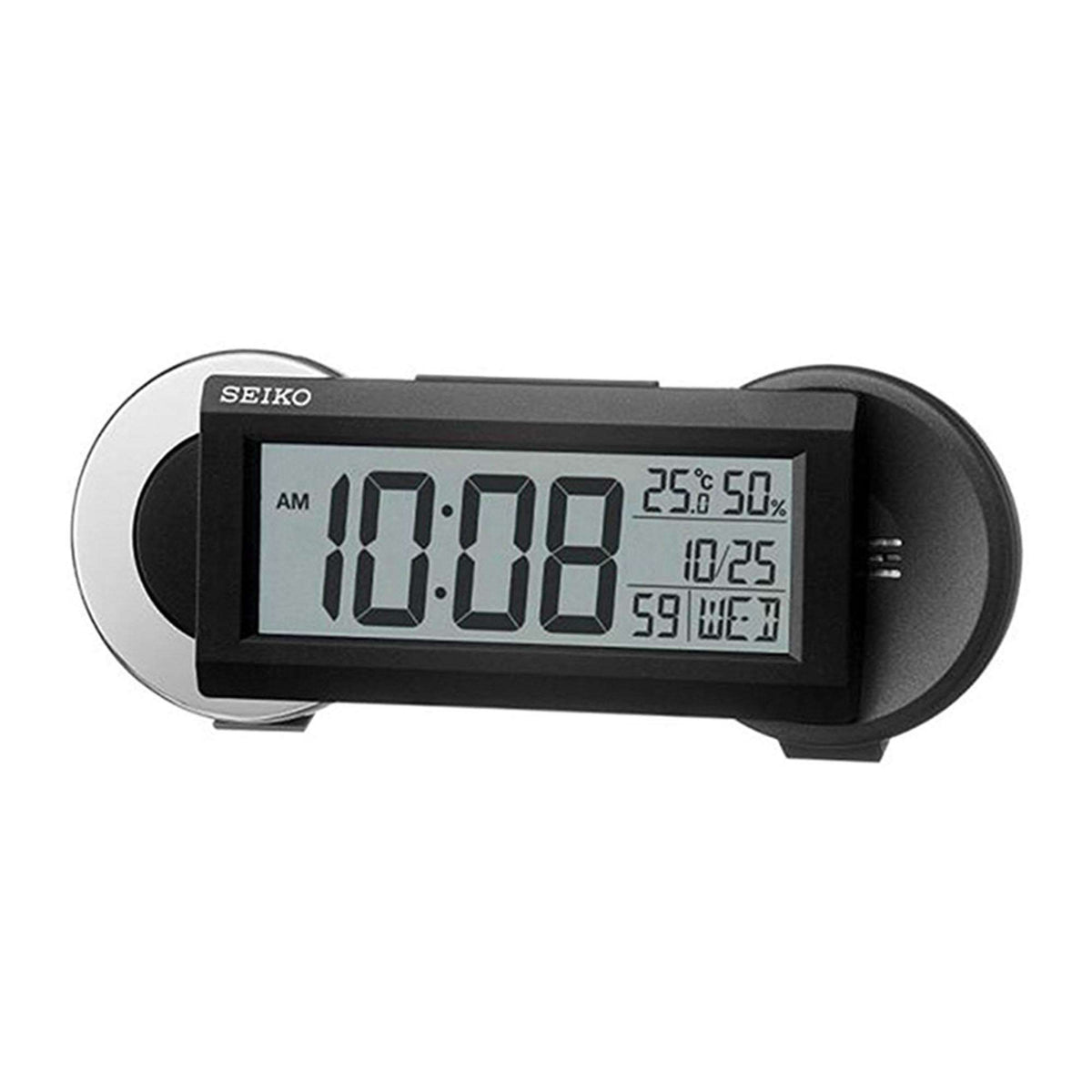 Black Seiko digital alarm clock with LCD showing time, humidity and calendar