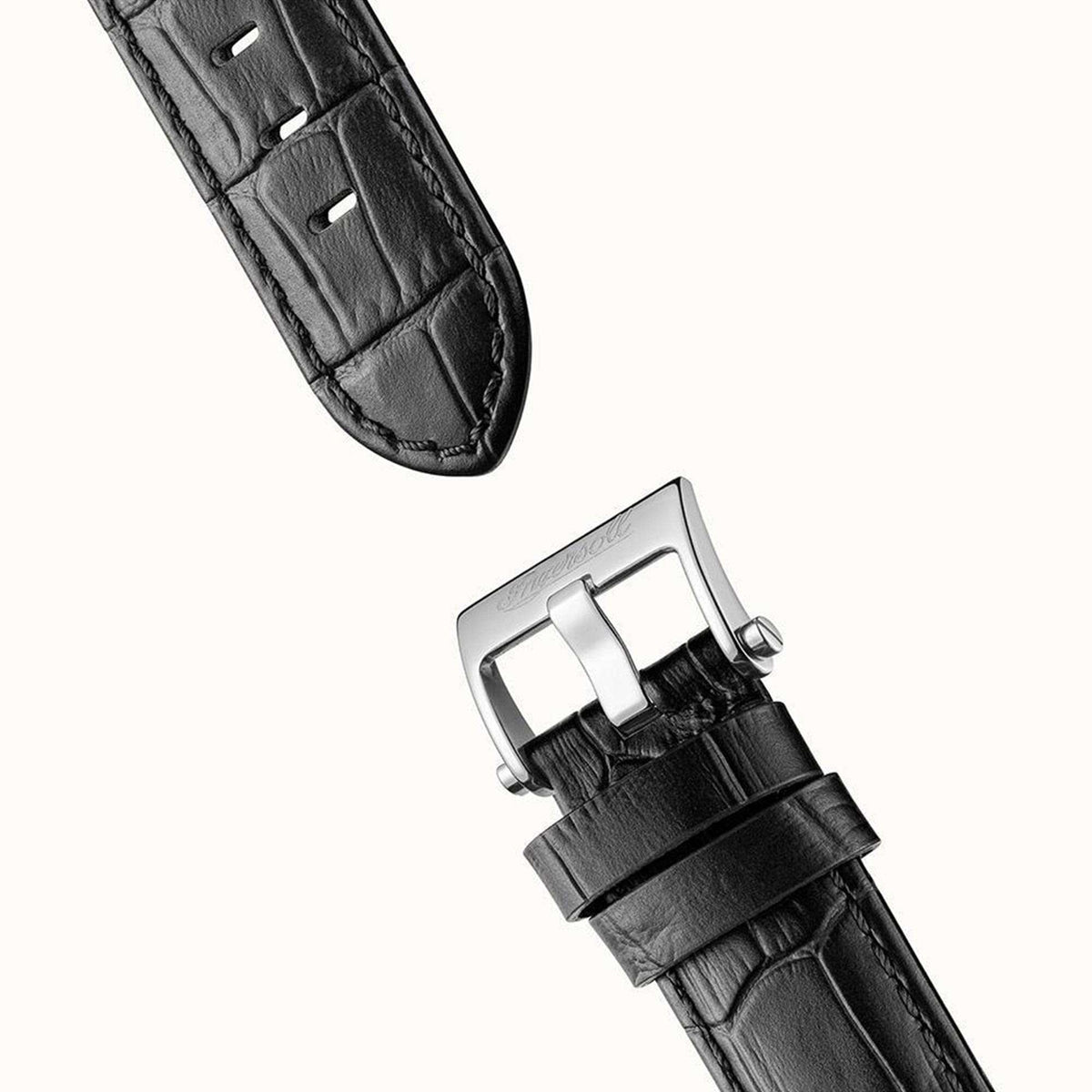 Black leather watch strap end with stitching holes and silver buckle hardware