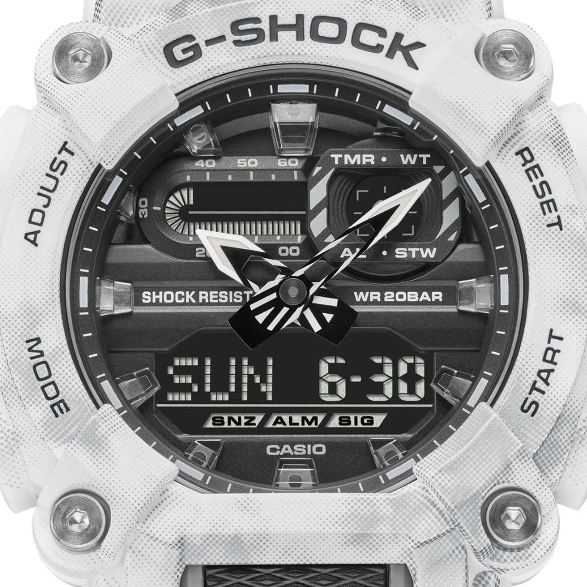 Casio G-Shock watch dial close-up with black face, white hands, and “WR 20BAR” marking