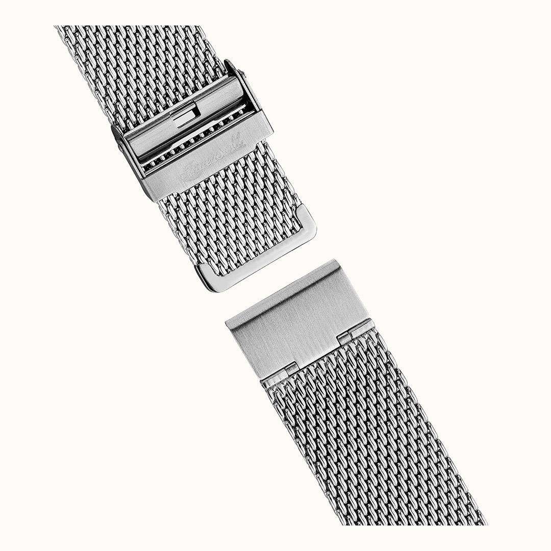 Silver Milanese mesh watch bracelet with clasp and links, on a stainless watch case.