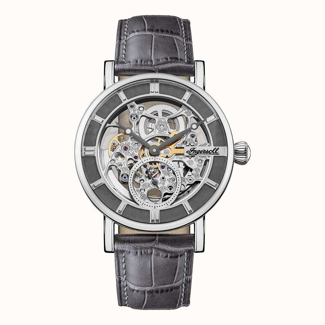 Skeleton automatic men’s watch with grey leather strap and silver case, open mechanics visible