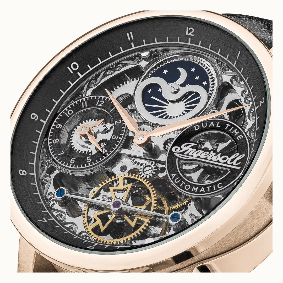 Men's automatic skeleton watch with black dial, moon/star subdials, rose-gold case, leather strap