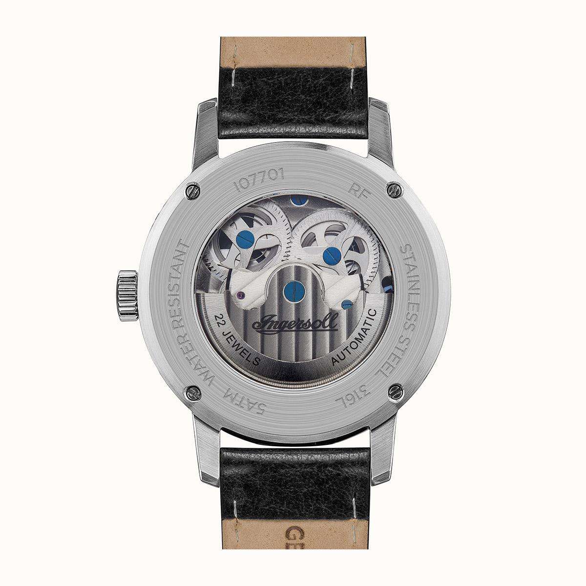 Men's automatic watch case back with engraved markings and leather strap