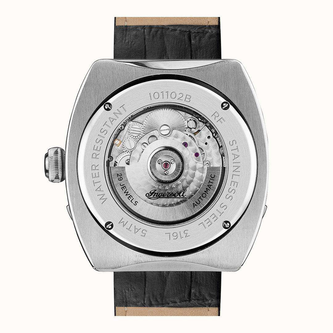 Men's automatic watch case back with visible stainless-steel movement, black leather strap.