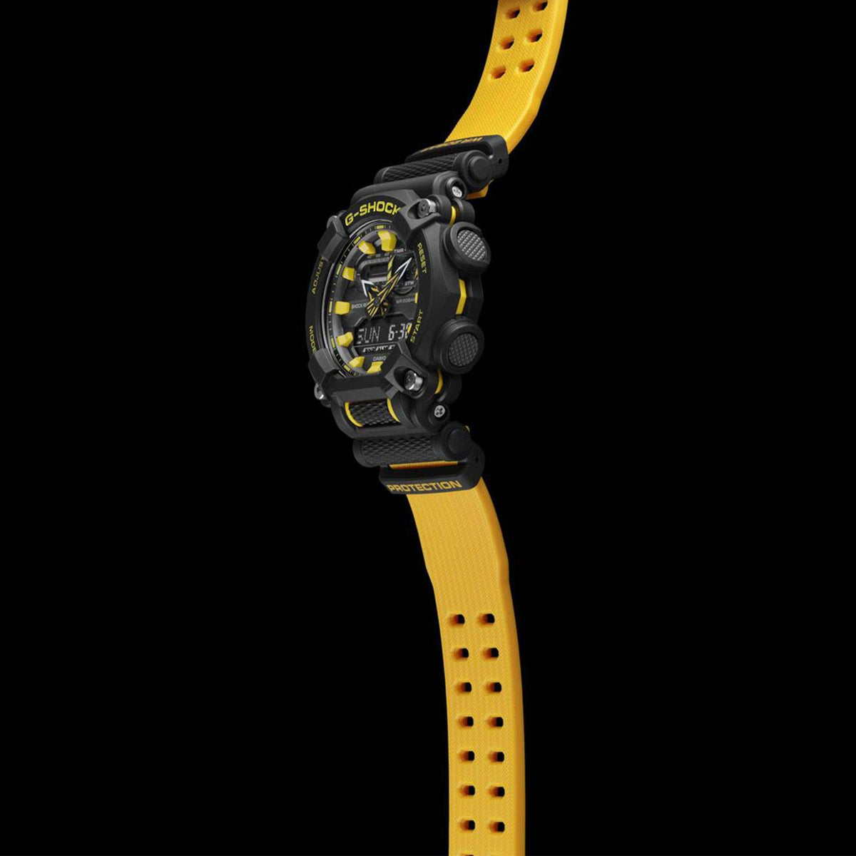 Men's sport wristwatch with black case and yellow resin strap, side profile