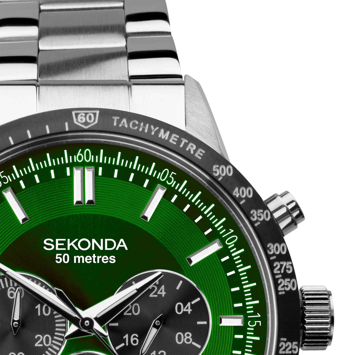 Close-up of men's chronograph watch face with green dial and white hour markers