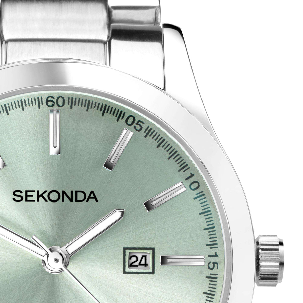 Green watch dial close-up with baton hour markers, minute track, and date window