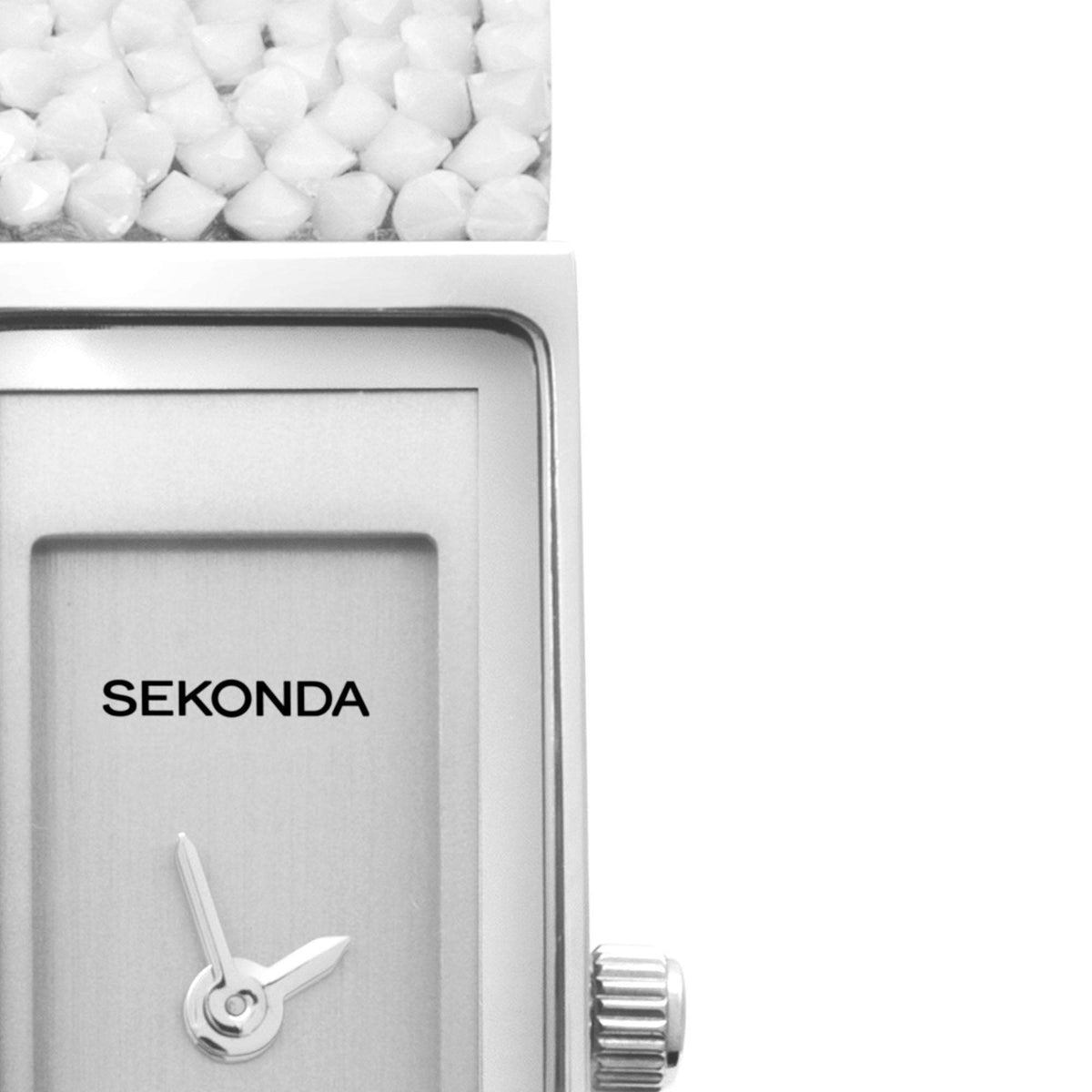Sekonda ladies quartz watch close-up: silver dial with SEKONDA logo and minute hand