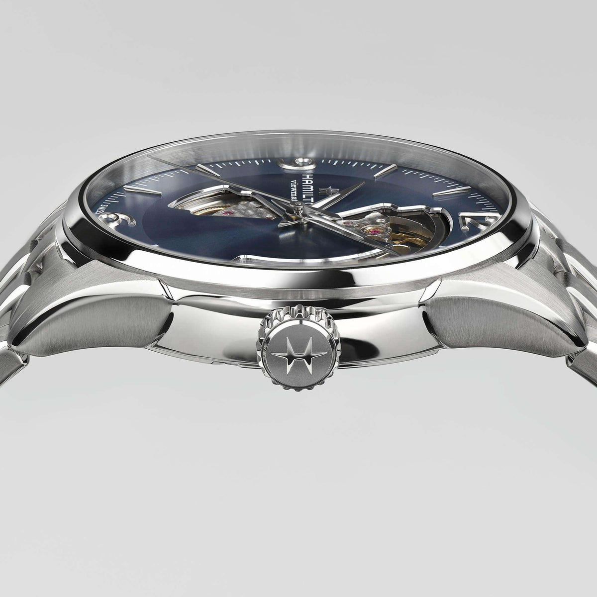 Hamilton Jazzmaster H32705141 watch side profile showing polished stainless steel case, signed winding crown, and thin bezel