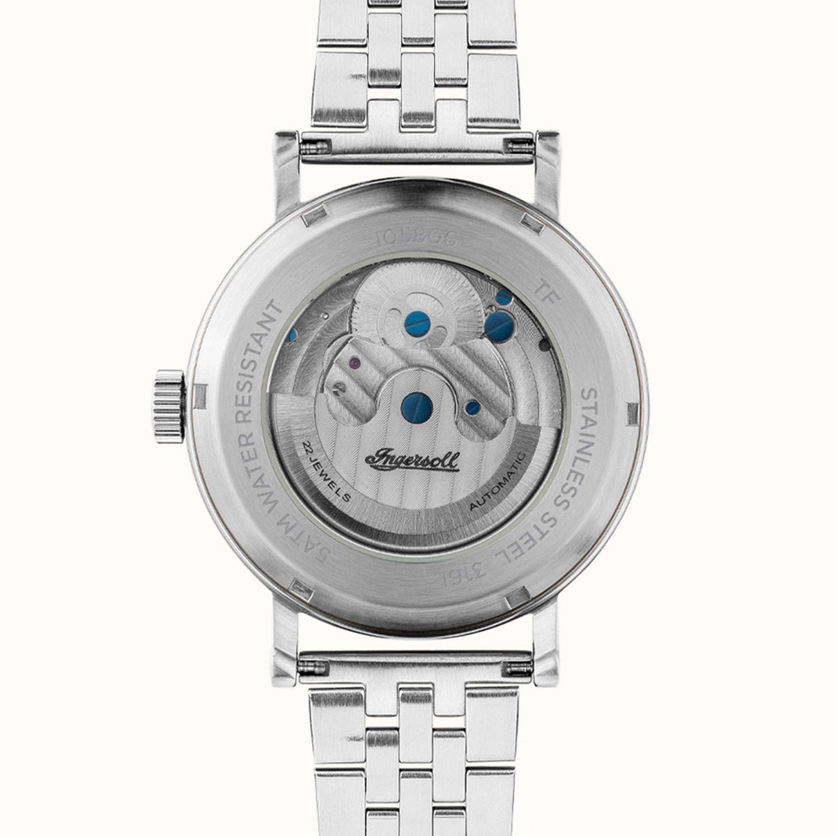 Stainless steel caseback with engraved text and blue accents on automatic watch