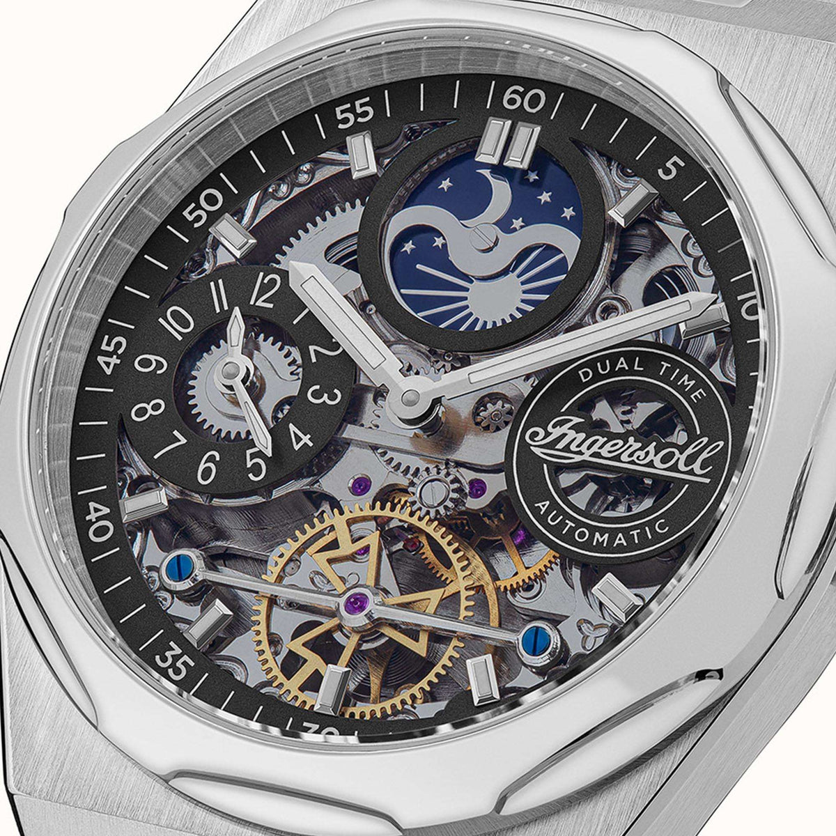 Stainless steel dual time automatic watch with black skeleton dial, blue moon motif, round bezel