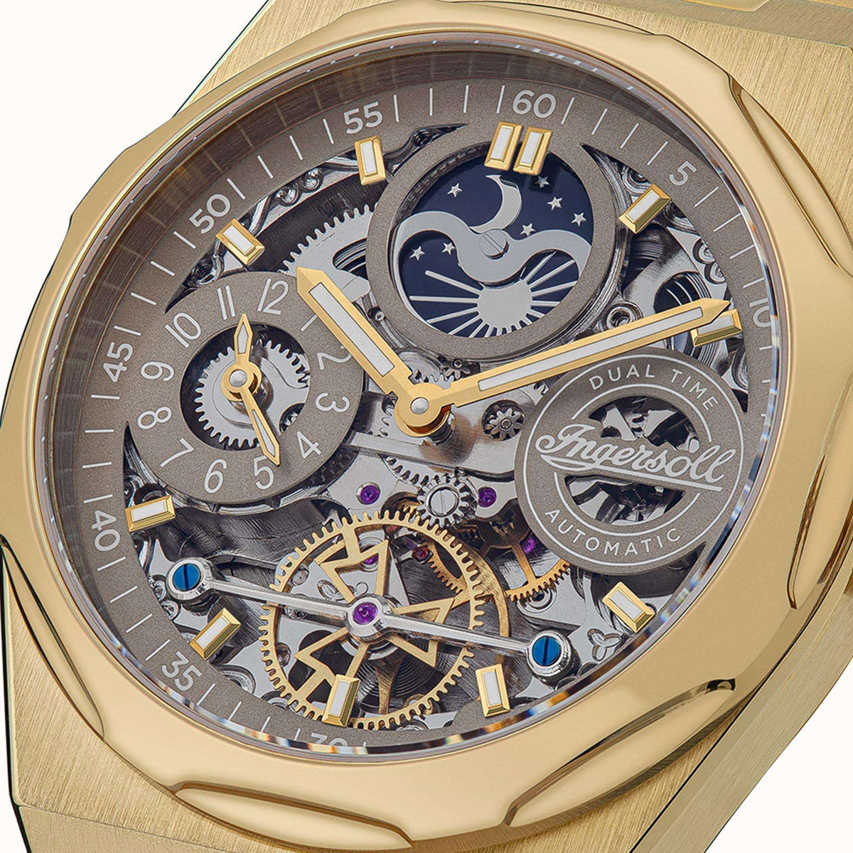 Gold-tone automatic men's watch with skeleton dial, blue moon-phase, and Roman markers