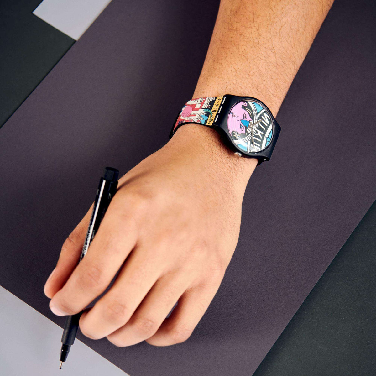 Ladies silicone strap quartz watch on wrist with colorful dial and black bezel